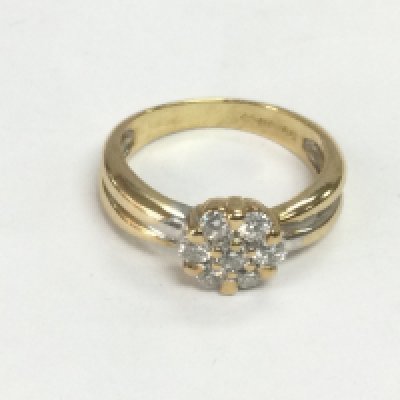 An 18ct gold diamond cluster ring, approx 1ct, approx 4.7g and approx size K. Shipping category A.