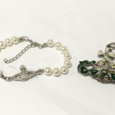 Vivienne Westwood jewellery including a flower orb necklace pendant , postage catA