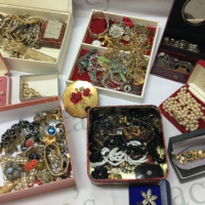 A box of costume jewellery including necklaces, bracelets, earrings etc , postage category C