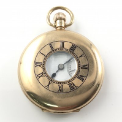 A 9ct gold Vertex half Hunter Pocket watch. Winds and runs. Total weight 95.91
