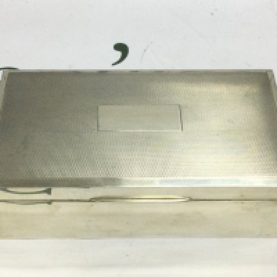 A silver cigarette box, Birmingham hallmarks. Shipping category B.