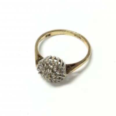 A 9ct gold diamond cluster ring. Approx weight 2.25 grams, approx size N.