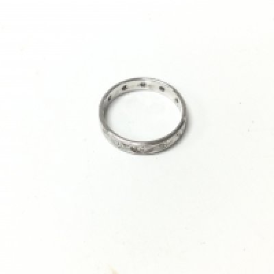 An 18ct white gold eternity band set with stones. Approx weight 3.17 grams, size O 1/2.