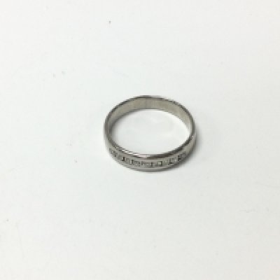 An platinum diamond set band. Approx weight 3.48 grams, size Q1/2.