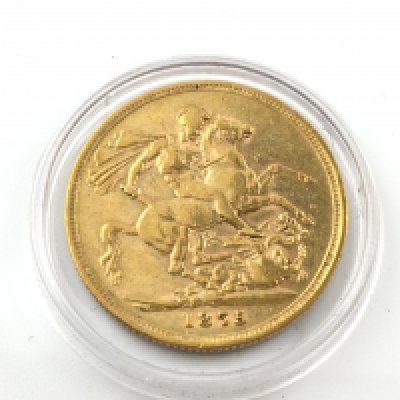 An 1875 full sovereign with Melbourne mint mark in coin capsule. Postage A