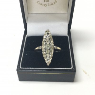 A 1920s marquise diamond cluster ring. Approx weight 4.36 grams, size V.