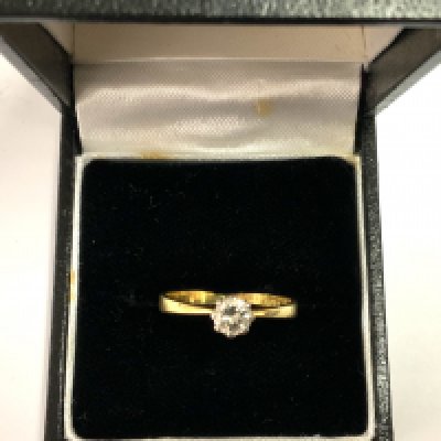 WITHDRAWN- An 18ct yellow gold diamond solitaire, approximately 0.25ct (Size M).
