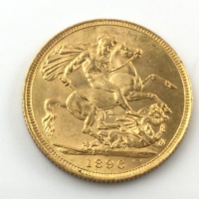 An 1896 full sovereign with possibly a Sydney mint mark in coin capsule. Postage A