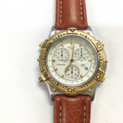 A Rotary quartz Chronograph watch on brown leather strap. Postage B. NO RESERVE