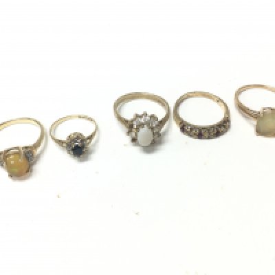 A collection of five 9ct gold stone set rings. Approx weight 11.67 grams.