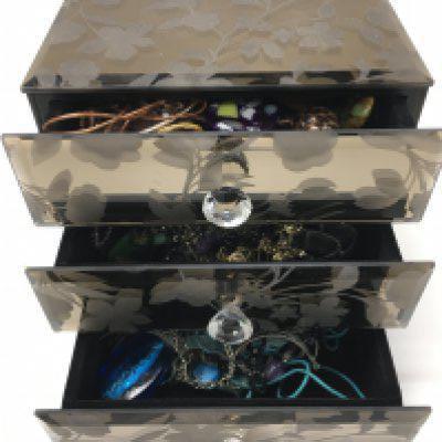 A box of costume jewellery including necklaces, earrings etc. postage category B