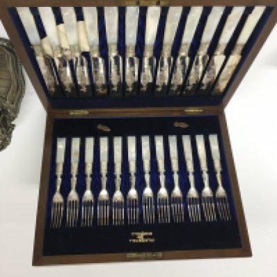 A Quality silver plated cased set of fruit knifes and folks with mother of pearl handles maker Walker Hall and a silver plated dish and other ornaments