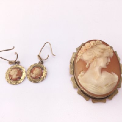 A pair of 9ct gold cameo earrings 9ct cameo bracelet and a cameo brooch. 9.23g