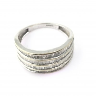 A 9ct white gold baguette cut cluster ring. Size P and 3.81g