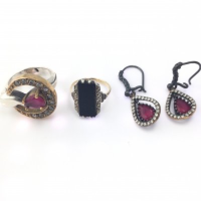 A silver and gilt ring and a 9ct and silver ring and a pair of earrings. Postage B