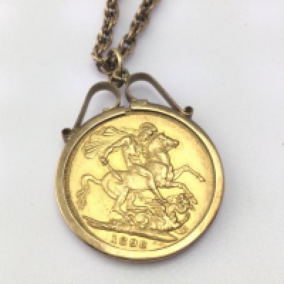 A 1898 full sovereign in pendant on chain. 17.46g