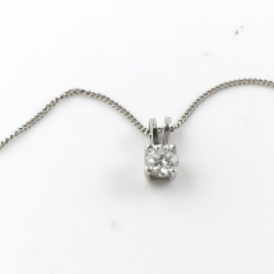An 18ct white gold diamond solitaire pendant. Diamond is Approx 0.30ct. 2.21g total. Postage A
