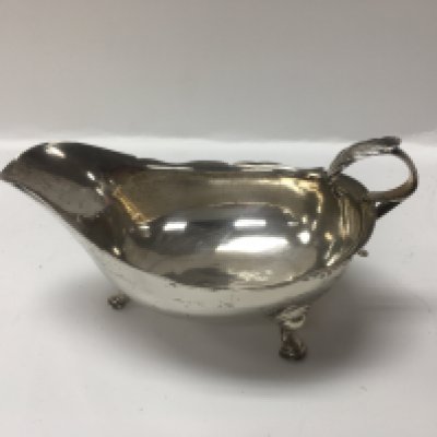 A George III sterling silver sauce boat, London 1797 hallmarks. Approx weight 94grams.