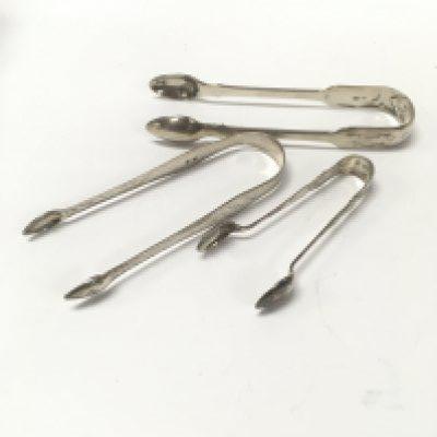 Three pairs of silver sugar tongs. Approx weight 118 grams.