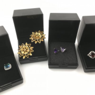 Four pairs of earrings set with assorted gems including garnets etc. Postage B