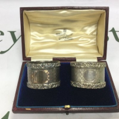 A boxed pair of heavy silver napkin rings, Birmingham hallmarks. Shipping category B.