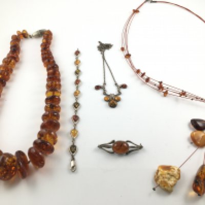 A collection of amber and silver and amber jewellery. Postage B