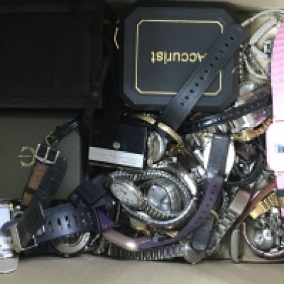 A box of mixed watches including Avia, DKNY, Micheal Kors etc. postage category C