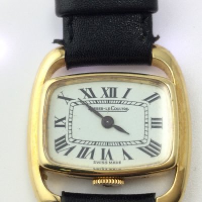 A Jaeger Lecoultre 18ct gold watch. Manual wind movement seen running.