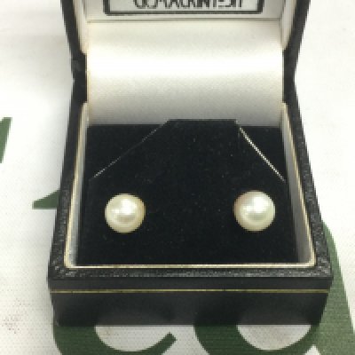 A pair of pearl and 9ct gold earrings. Shipping category A.