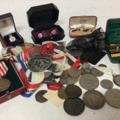 A collection of used coinage medals and other oddments.
