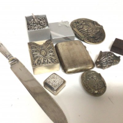 A collection of silver oddments a card case watch chains snuff box cigarette case and other oddments