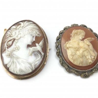Two cameo brooches. Postage B