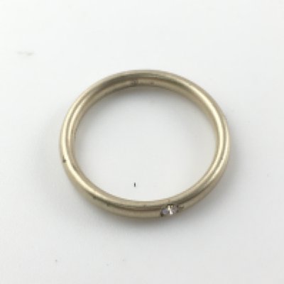 A pomellato 18ct and diamond ring. 2.84g and size K Postage A