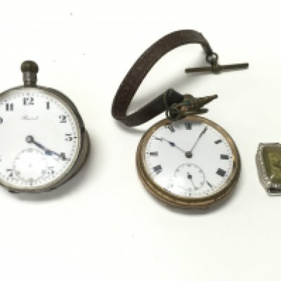 A vintage platinum watch along with a silver pocket watch and one other. Postage B