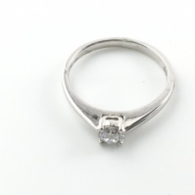 A platinum and 0.29ct diamond solitaire ring. Size M and 3.14g Postage A