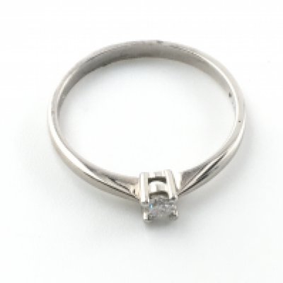 An 18ct white gold and 0.10ct diamond ring. Size L 1/2 and 1.77g Postage A
