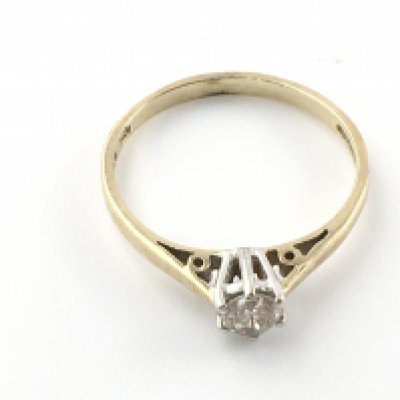 A 9ct gold 0.10ct diamond solitaire ring. Size J and 1.13g Postage A