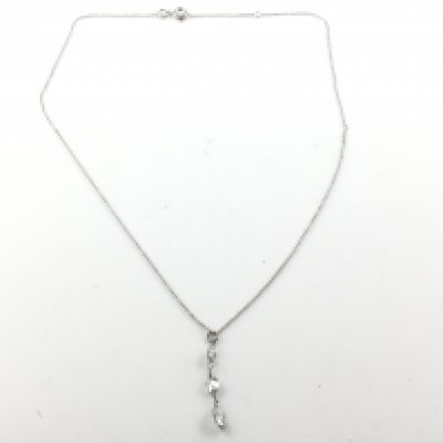 An 18ct white gold 1.37ct diamond drop necklace. Postage A