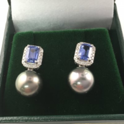 A pair of black pearl set cut sapphire and diamond drop earrings. Sapphires approximately 1.41ct and diamonds 0.15ct. Postage B