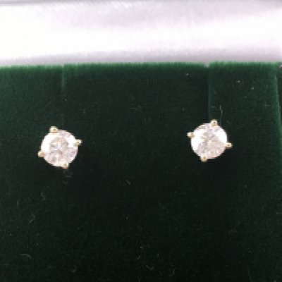 Pair of 18ct yellow gold 4 claw set diamond solitaire studs. Diamonds approximately 0.41ct Postage B