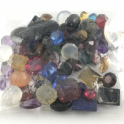 Mixed parcel of unmounted gemstones including moonstone lapis lazuli amethyst etc approximately 60ct total. Postage A