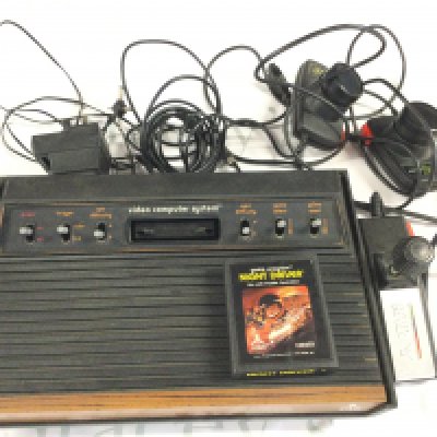 A Atari Video Computer system with Game Night Driver. No Reserve.