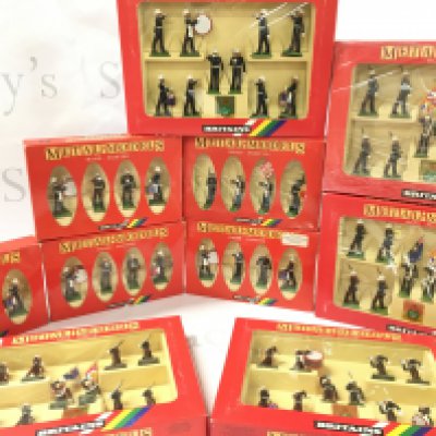 A Collection of Boxed Britains Soldiers. Including Royal Marine Bands. And U.S. Marines. No Reserve.