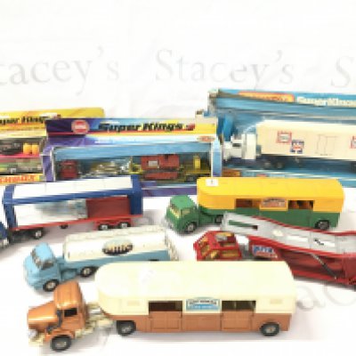 A Collection of Boxed And Loose Diecast Trucks By Matchbox And Corgi. Boxes Are in A Poor State. No Reserve.