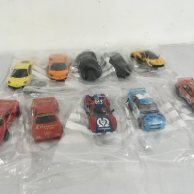 A collection of 10 Scalextric cars.