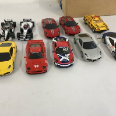 A collection of 10 Scalextric..Hornby slot racing cars. Some ready to race some for spares or repair. No reserve.