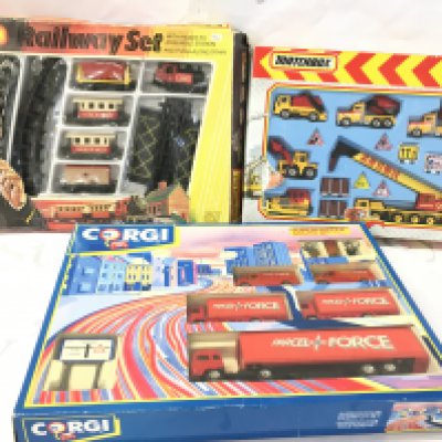 3 Boxed Diecast Gift Sets including Matchbox Railway Set #G-2. A Matchbox Construction Set #CS5 And A Corgi Superhauler Despatch Set #92610.