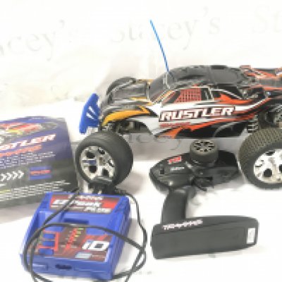 A Traxxas Rustler Remote Controlled Car With Charger. Instructions. And Remote. No Reserve.