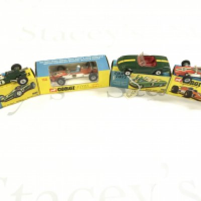 4 X Boxed Corgi Vehicles. A Lotus-Climax Formula 1 Racing Car #155. A lotus Climax F1 #158. A Lotus Elan Coupe #319 and A Lotus Climax #158.