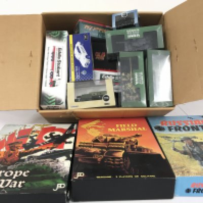 A collection of boxed diecast model vehicles by Atlas..Oxford etc which includes some military includes several loose Playworn vehicles. Also 3 boxed war games. No reserve